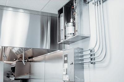 A Fire Suppression System Installed In An Industrial Kitchen 1